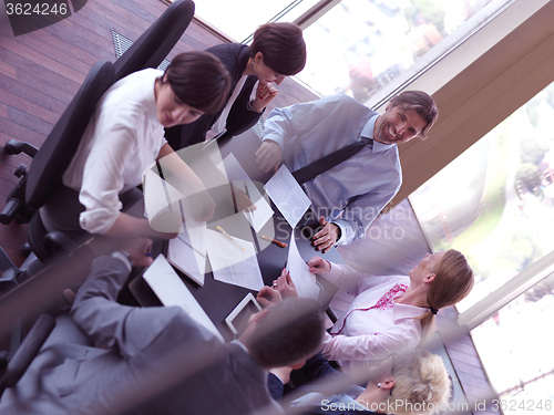 Image of business people group on meeting at bright modern office
