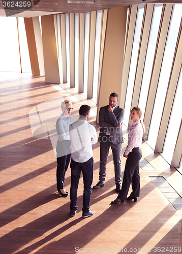Image of business people group standing together