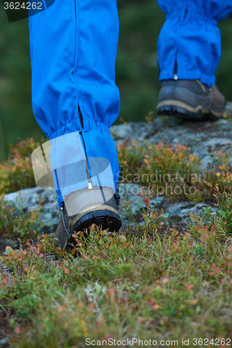 Image of hiking man with trekking boots