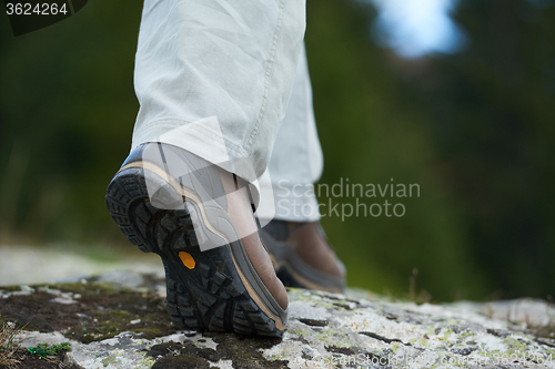 Image of hiking man with trekking boots