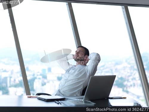 Image of young business man at office