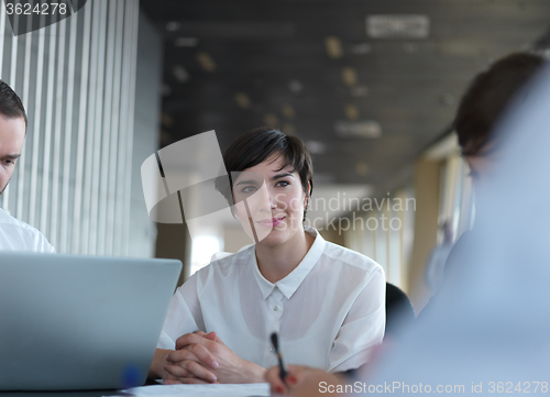 Image of business people group on meeting at bright modern office