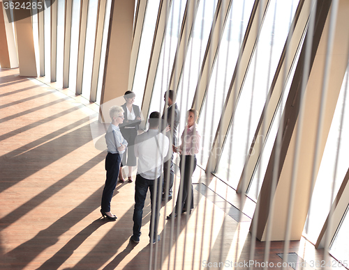 Image of business people group standing together