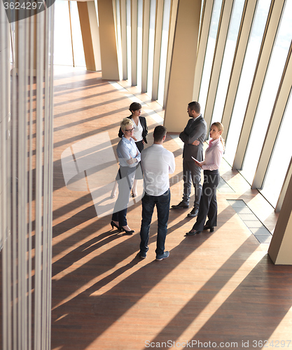 Image of business people group standing together