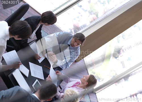 Image of business people group on meeting at bright modern office
