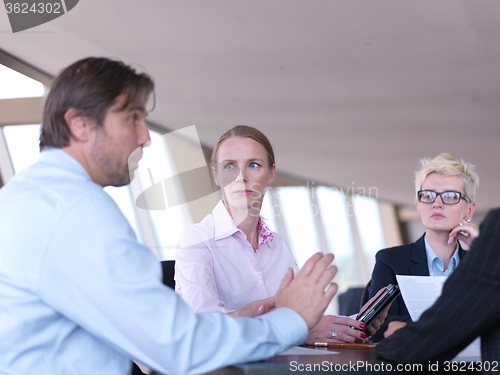 Image of business people group on meeting at bright modern office