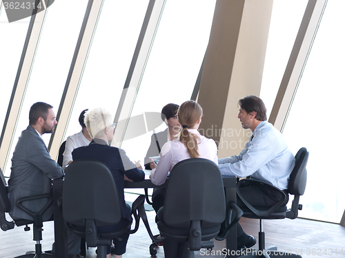 Image of business people group on meeting at bright modern office