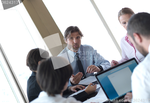 Image of business people group on meeting at bright modern office