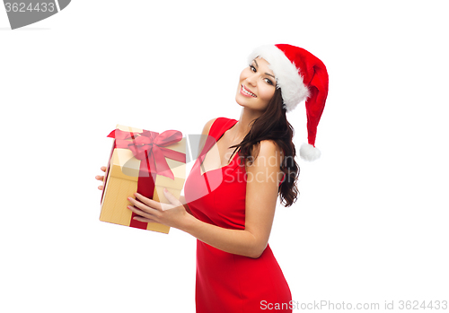 Image of beautiful sexy woman in santa hat with gift box