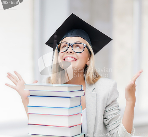 Image of happy student in graduation cap