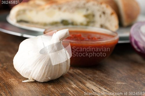 Image of Garlic Bulb with Italian Food