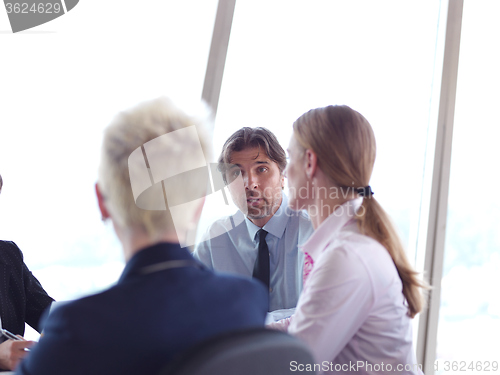 Image of business people group on meeting at bright modern office