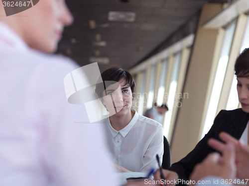 Image of business people group on meeting at bright modern office