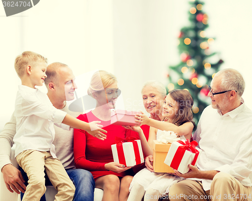 Image of smiling family with gifts