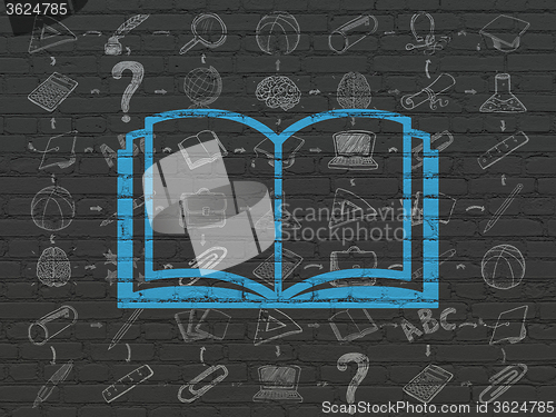 Image of Learning concept: Book on wall background
