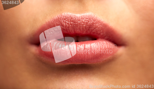 Image of close up of young woman lips