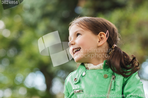 Image of happy beautiful little girl portrait outdoors