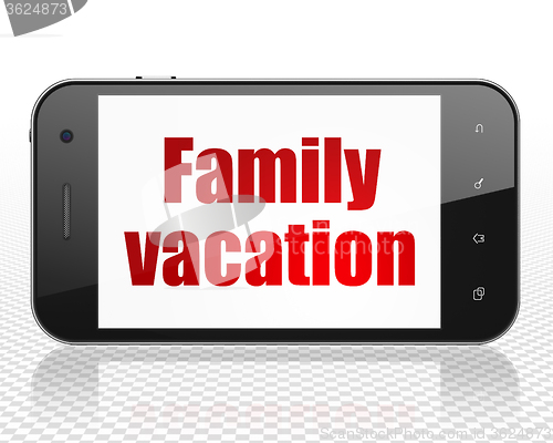 Image of Tourism concept: Smartphone with Family Vacation on display