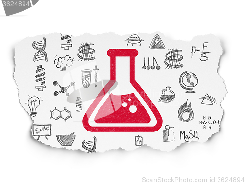 Image of Science concept: Flask on Torn Paper background