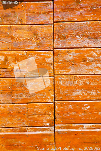 Image of grain texture of  brown  old door in italy   europe