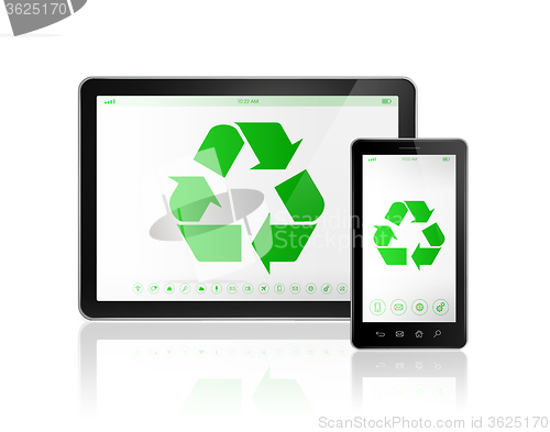 Image of Digital tablet PC with a recycle symbol on screen. environmental