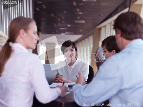 Image of business people group on meeting at bright modern office