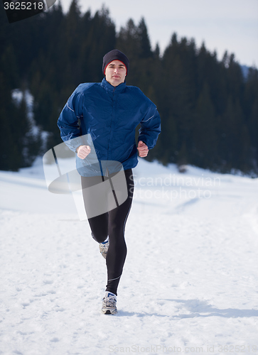 Image of jogging on snow in forest