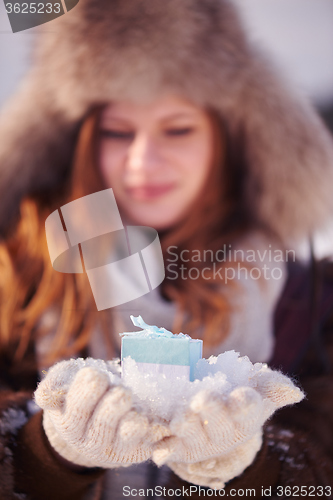 Image of winter girl with gift