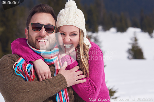 Image of romantic young couple on winter vacation