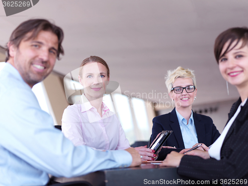 Image of business people group on meeting at bright modern office
