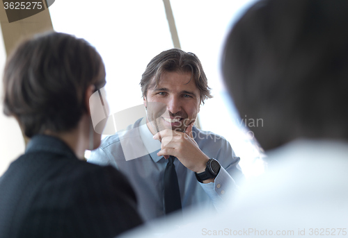 Image of business people group on meeting at bright modern office