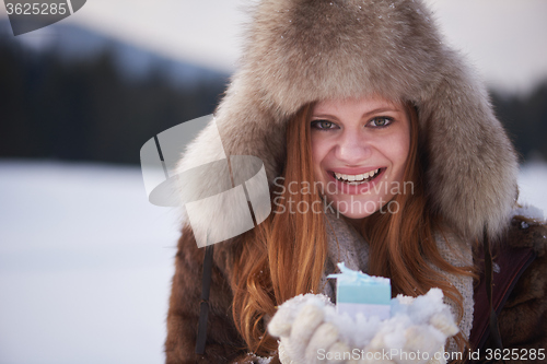 Image of winter girl with gift