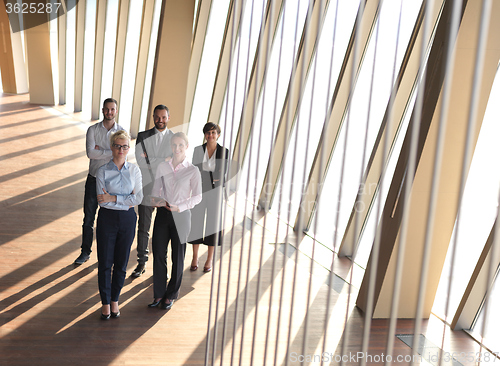 Image of business people group standing together