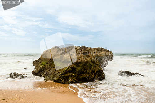 Image of Ocean crashing over rock