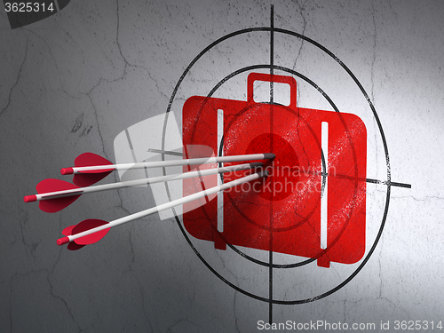 Image of Travel concept: arrows in Bag target on wall background