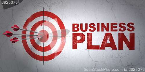 Image of Business concept: target and Business Plan on wall background