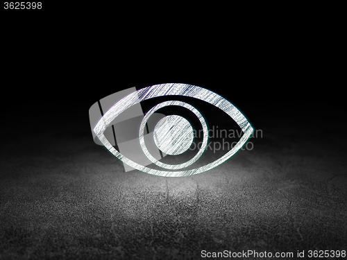 Image of Protection concept: Eye in grunge dark room