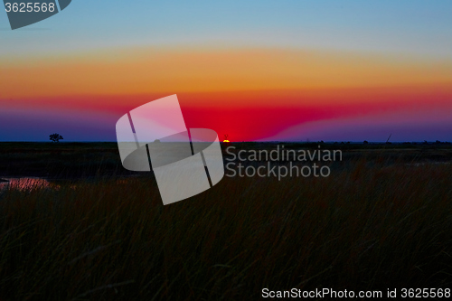 Image of beautiful sunset in steppe 