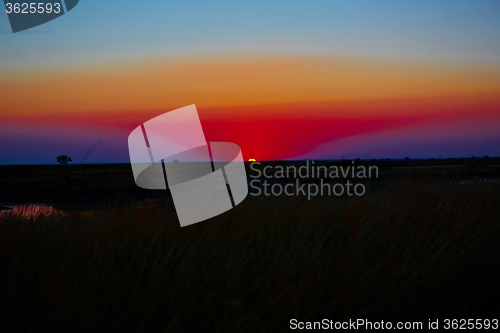 Image of beautiful sunset in steppe 