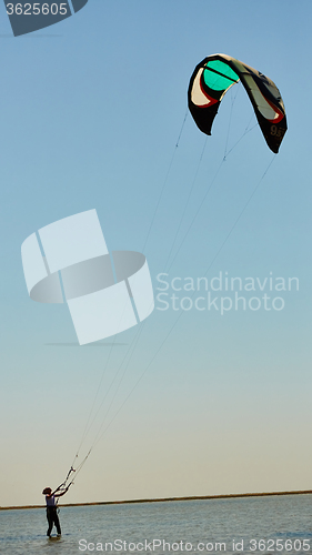 Image of young woman kite-surfer