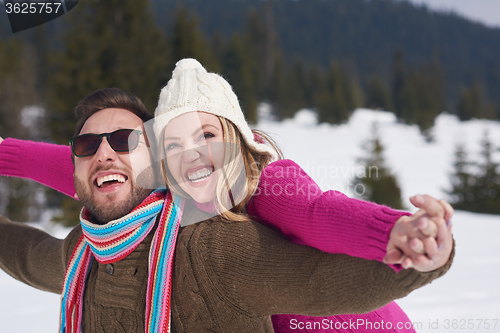 Image of romantic young couple on winter vacation