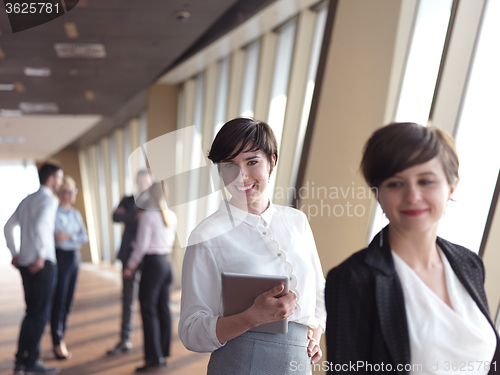 Image of business people group standing together