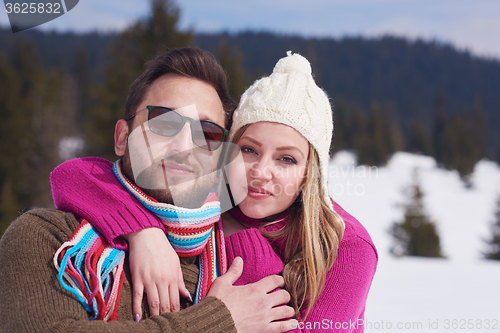 Image of romantic young couple on winter vacation
