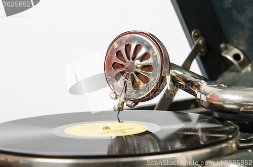 Image of The needle on a gramophone record gramophone in closeup