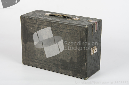 Image of Old suitcase with gramophone standing on a white background isolated