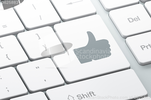 Image of Social media concept: Thumb Up on computer keyboard background