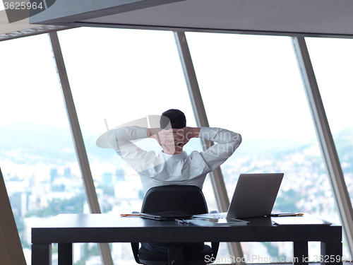 Image of young business man at office