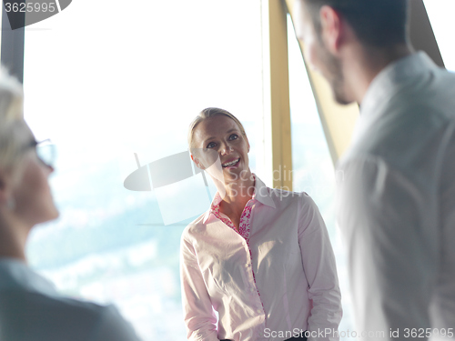 Image of business people group on meeting at bright modern office