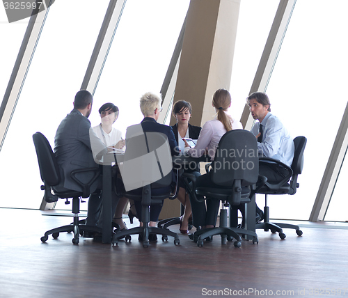 Image of business people group on meeting at bright modern office