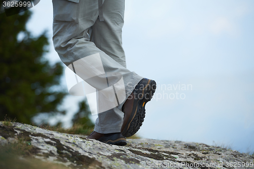Image of hiking man with trekking boots